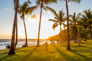 sunset on the beach of Grand’Anse, Réunion Island  - obrazy, fototapety, plakaty