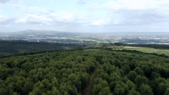 Aerial View over Forest on a Scenic Hill
