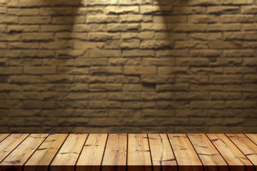 On top of an empty wooden table, the backdrop is a wall of blocks and lights.
