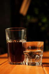 alternative coffee and a glass of water. close-up