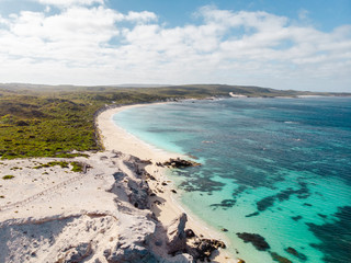 Fototapeta na wymiar Aerial drone landscape of Hamlin Bay, Western Australia. Paradise like waters with jagged rocks surrounding the perfect beach. 