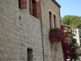 Fototapeta na wymiar Narrow cobbled ancient streets in traditional town Deir el Qamar, Lebanon