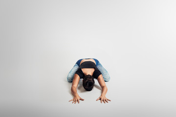 Fototapeta na wymiar Yoga child pose, stretching, woman on white backgroung, studio photos