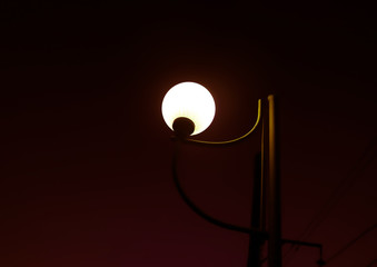 lamp on dark red background