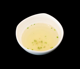 White cup with immersing water for quenching