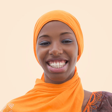 Beautiful Teenager Girl Wearing A Headscarf And Smiling