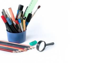 office and school supplies in the holder.isolated on white background