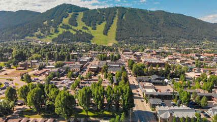 Jackson Hole, Wyoming. Panoramic aerial view of town and landscape on a beautiful summer morning. - obrazy, fototapety, plakaty