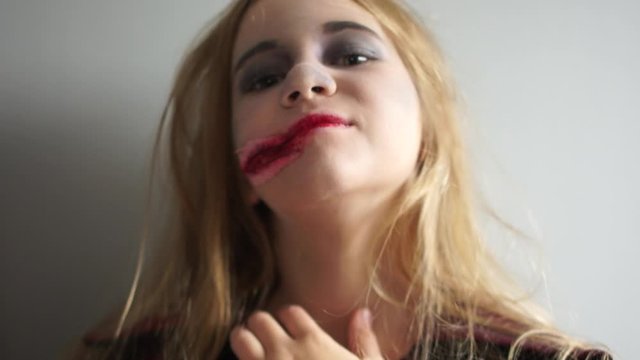 Lovely teenage girl in halloween makeup of a dead bride. Halloween tradition