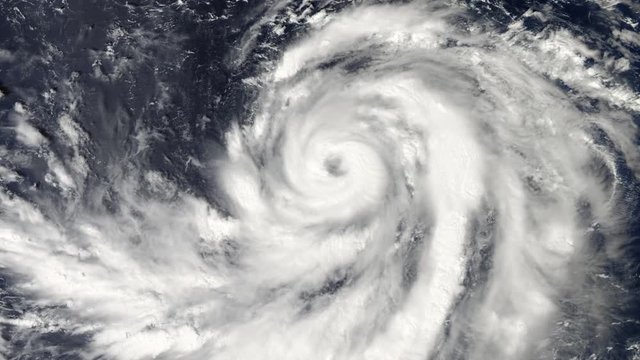Tropical storm view from satellite in outer space. 3D animation made of image from NASA. Natural disaster, hurricane, cyclone and typhoon concept. Seamless loop video 4K