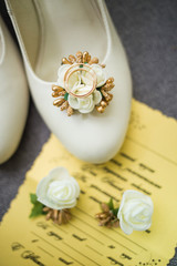 Fototapeta na wymiar wedding rings on shoes