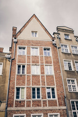 Fototapeta na wymiar old brick buildings with windows. Gdansk, Poland