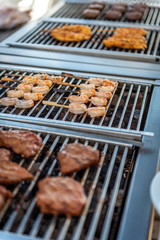 Grilling shrimps on the barbecue in a restaurant during a wedding