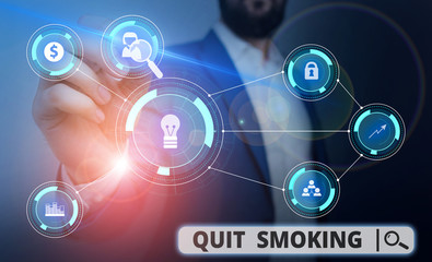 Word writing text Quit Smoking. Business photo showcasing process of discontinuing tobacco smoking or cessation Male human wear formal work suit presenting presentation using smart device