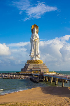 Statue of goddess Guanyin on the territory of Buddhist center Nanshan, Sanya, Hainan island, China