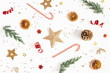 Christmas composition. Fir tree branches, golden and red decorations on white background. Christmas, winter, new year concept. Flat lay, top view