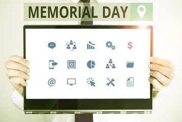 Fototapeta premium Word writing text Memorial Day. Business photo showcasing remembering the military demonstratingnel who died in service Male human holding thick textured cardboard of business promotion concept