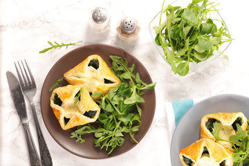 pastry filling with spinach and salad