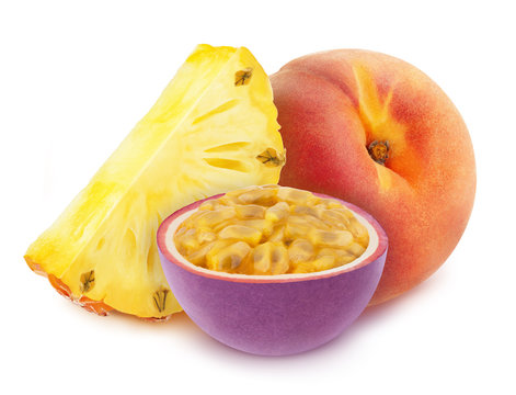 Multicolored composition with assortment of fruits - pineapple, peach and passion fruit, isolated on a white background with clipping path.