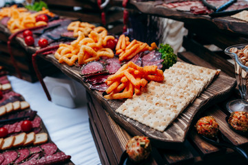 Luxury food and drinks on corporate party table.