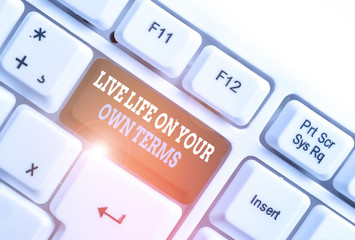 Writing note showing Live Life On Your Own Terms. Business concept for Give yourself guidelines for...