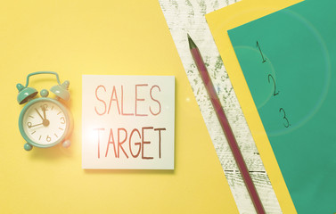 Conceptual hand writing showing Sales Target. Concept meaning specified amount of sales that a...