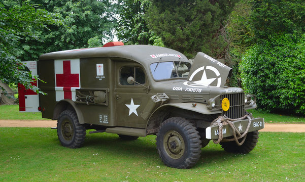  Second World War  Ambulance parked in front of trees.