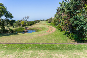 Fototapeta na wymiar Golf Course Hole Green Scenic Coastal Landscape