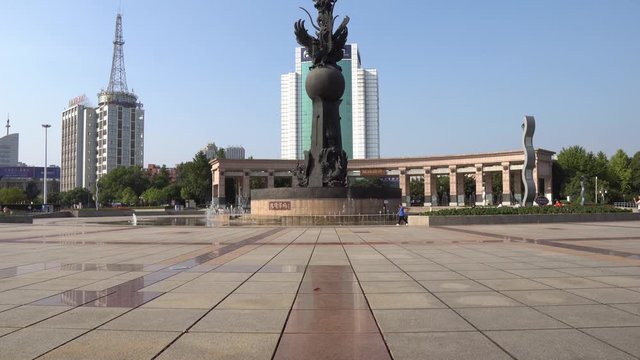  Wuhu Anhui Jiuzi Square View of Phoenix Sculpture Surrounded by Fountains near Buxingjie Pedestrian Road on a Sunny Blue Sky Day