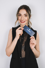 Front view woman holding business card with cyber monday