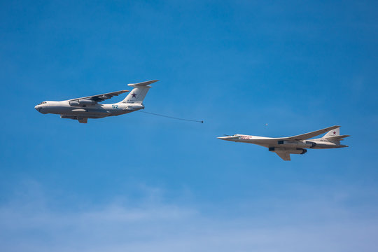 MOSCOW - MAY 09: Il-78 air tanker and Tu-160 strategic bomber imitate mid-air refueling during the parade in honor of WWII Victory on May 09, 2013 in Moscow, Russia
