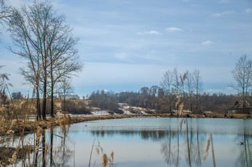 Obraz premium spring pond in the village