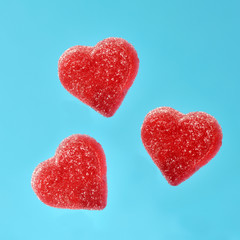 Obraz na płótnie Canvas Valentines card - sweet hearts on blue background