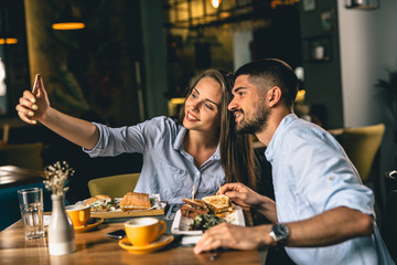 friends dinning outdoor at fancy restaurant