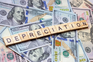 The word depreciation on dollar usa background.