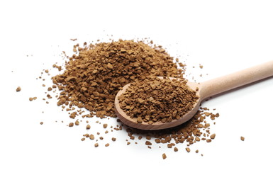 Instant coffee granules with wooden spoon, isolated on white background