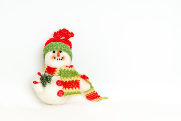 New year, Christmas, toy snowman close up macro isolated on the white background