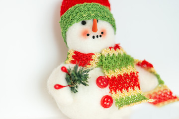 New year, Christmas, toy snowman close up macro isolated on the white background