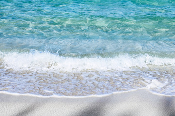 Background texture of crystal clear, turquoise water.