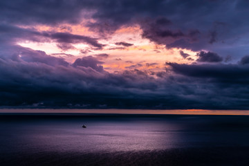 Fototapeta na wymiar Dramatic panoramic view of the sea and moody cloudy sky