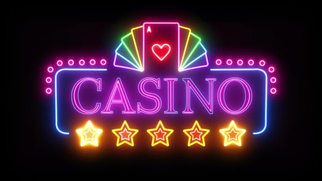 Abstract Bright Casino Neon Sign With Stars And Poker Cards On A Black Background. Seamless Loop