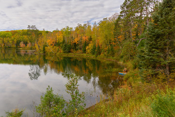 autumn landscape with lake and trees reflection 