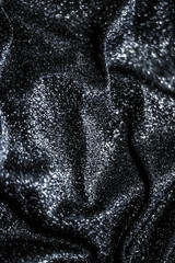 Silver holiday sparkling glitter abstract background, luxury shiny fabric material for glamour...