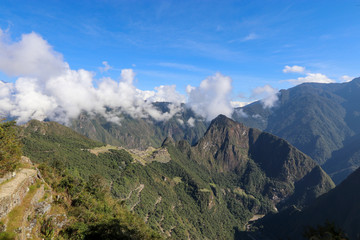 Peru - Machu Picchu - Stunning views over Machu Picchu as the cloud clears for the day to reveal...