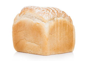 Fresh loaf of white bread on white background. Traditional bakery heritage.