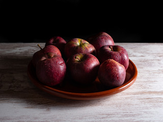 red apples on a plate