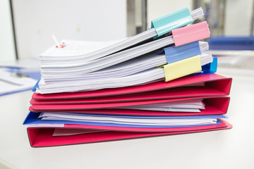 file folder and Stack of business report paper file on the table