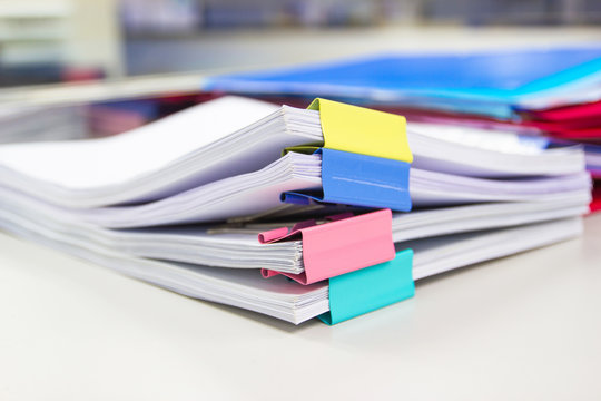 file folder and Stack of business report paper file on the table in a work office, concept document in work office