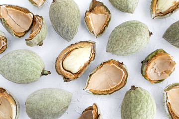 Fresh young green almonds flat lay