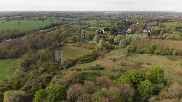 M42 Motorway Solihull Electricity Pylons English Wooded Countryside Spring Aerial 4K